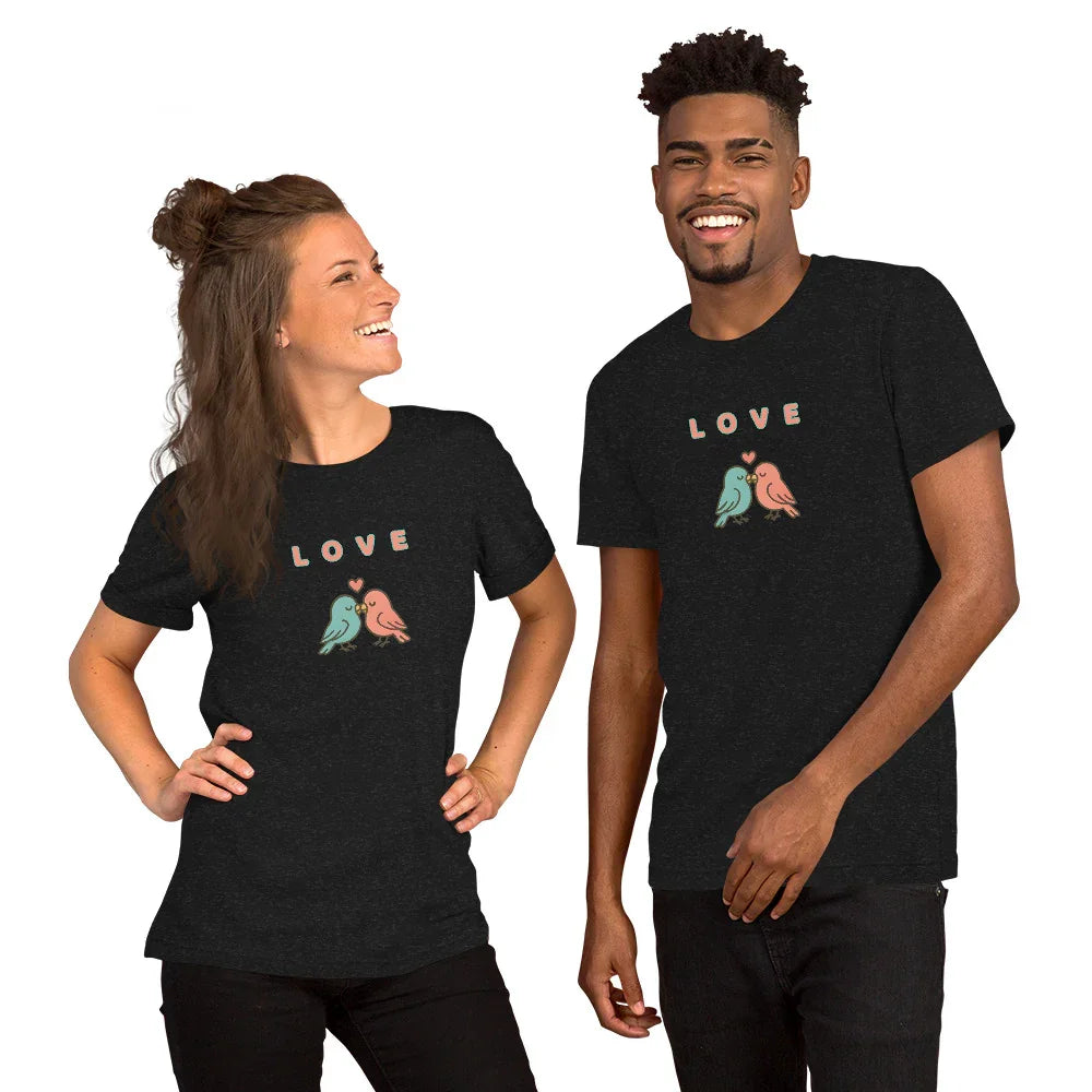 Black Heather Love Birds visual pun graphic tee featuring the text "LOVE" above an illustration of two birds.