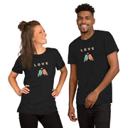 Black Heather Love Birds visual pun graphic tee featuring the text "LOVE" above an illustration of two birds.