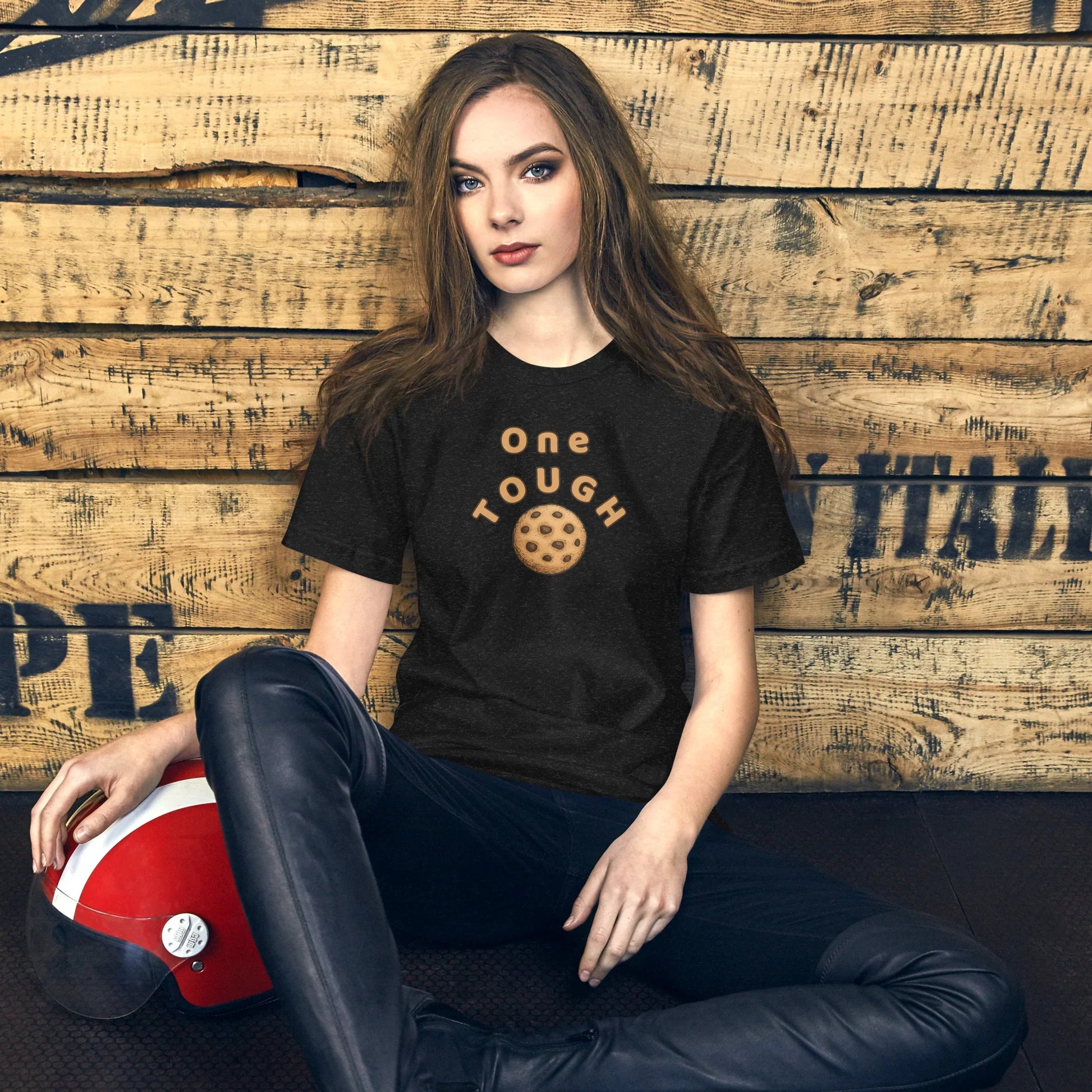 Black Heather One Tough Cookie visual pun graphic tee featuring the text "ONE TOUGH" above an illustration of a chocolate chip cookie.
