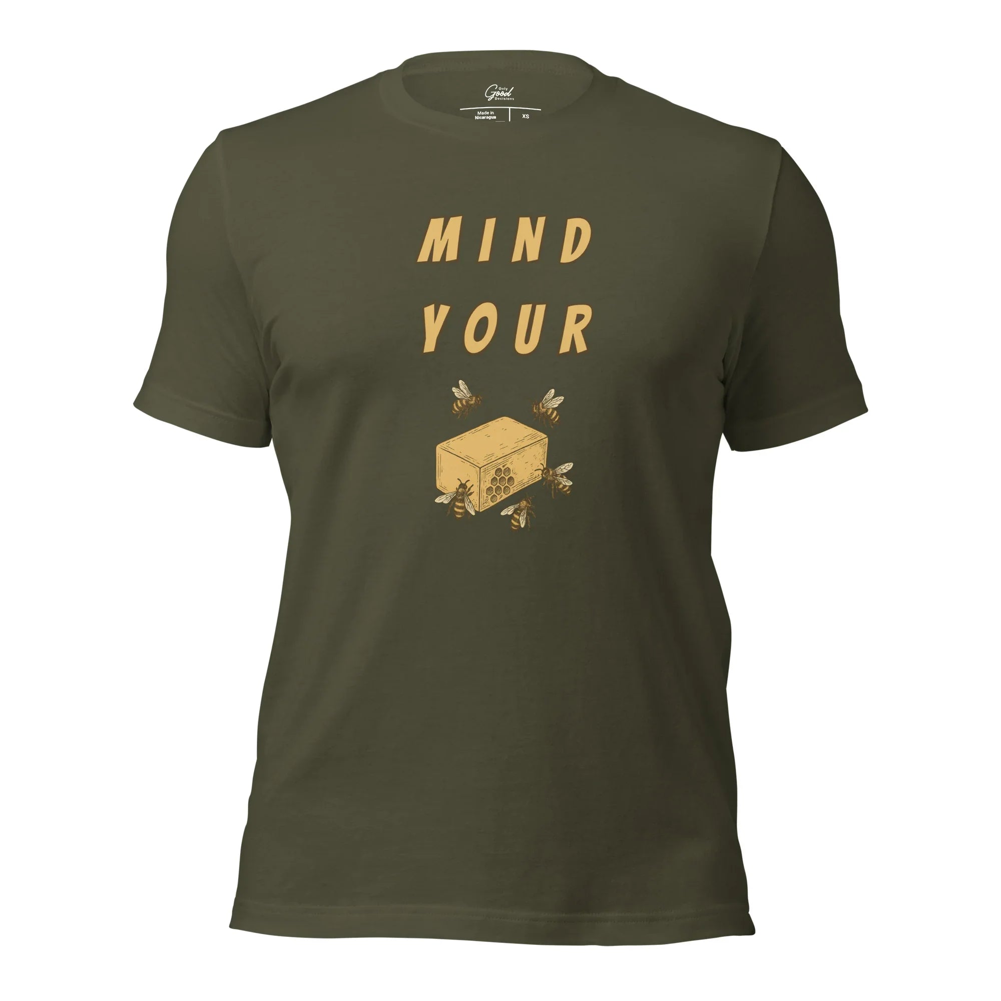 Military Green Mind Your Bee's Wax visual pun graphic tee featuring the text "MIND YOUR" above an illustration of bees and a block of wax.