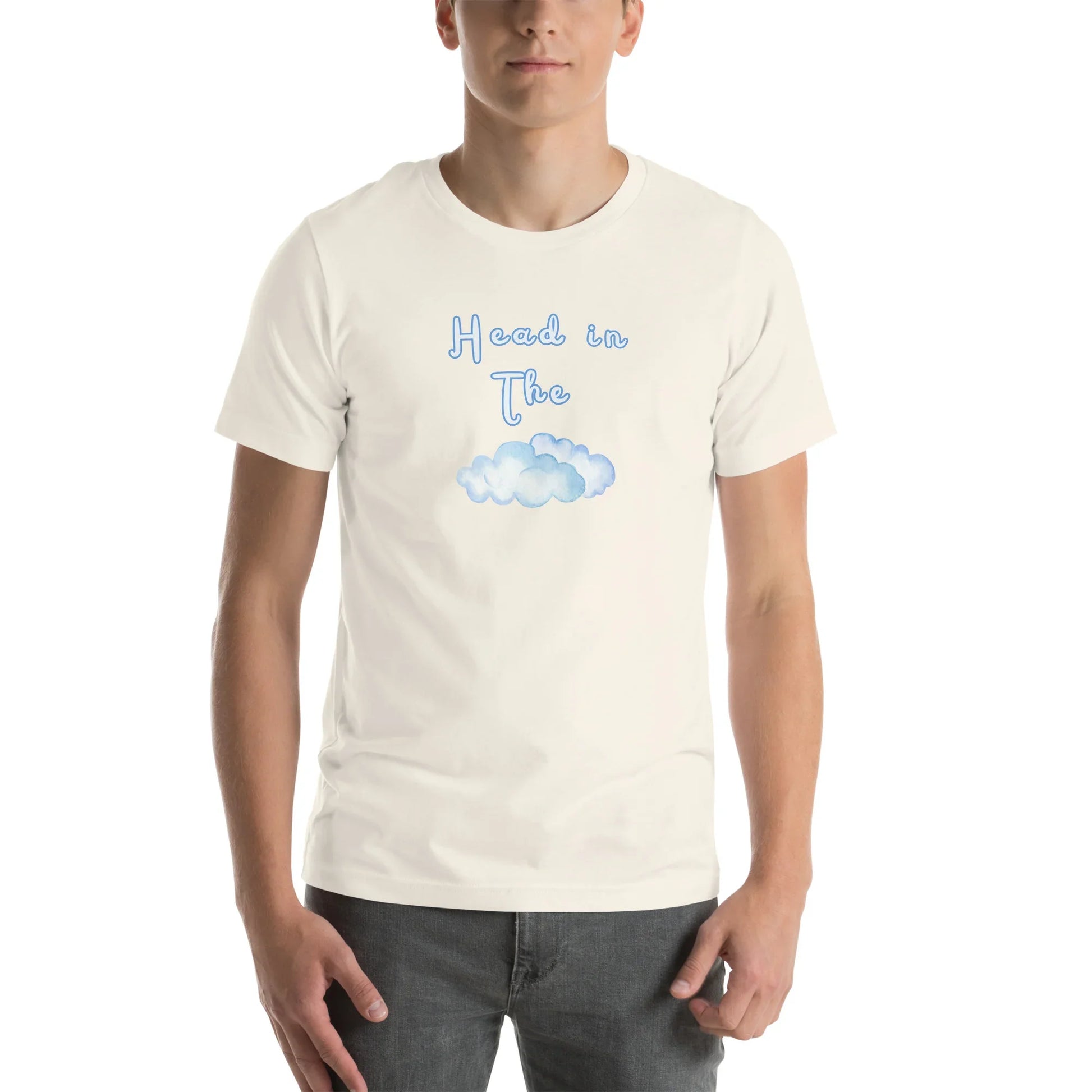 Vintage White Head In The Clouds visual pun graphic tee featuring "Head in The" text positioned above a blue watercolor cloud illustration.